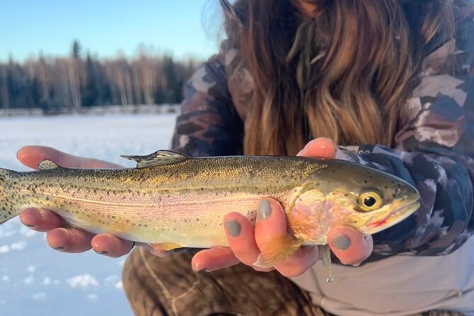 3 Hour Ice Fishing Experience - Getting warm inside the heated ice hut