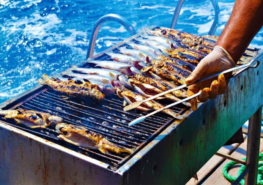 Agadir: Boat Trip with Fishing, Swimming, and BBQ Lunch - A Moroccan barbecue lunch onboard