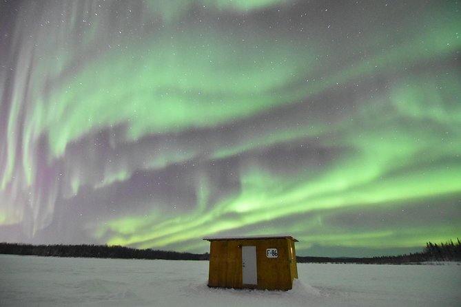 Aurora Borealis Viewing and Ice Fishing Adventure - Reindeer sausage, cocoa, and a fresh catch