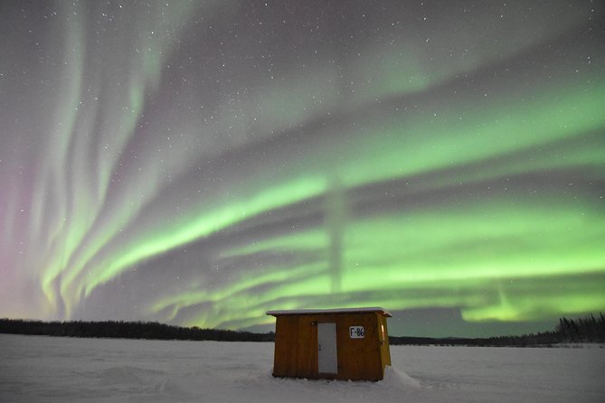 Aurora Borealis Viewing and Ice Fishing Adventure - A warm cabin at the center of the night