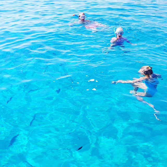 Cagliari: Private or Small Group Fishing Trip Experience - Swimming in clear Sardinian water