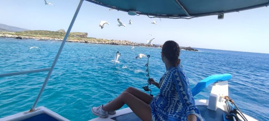 Crete: Fishing & Swimming Boat Cruise with Lunch & Drinks - Swimming and snorkeling in clear water