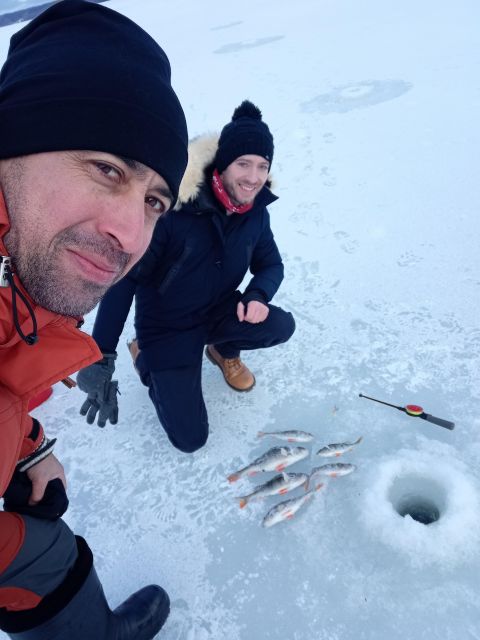 From Helsinki: Bodom Lake Ice Fishing with Food & Drinks - Drilling a hole and learning the pilkki