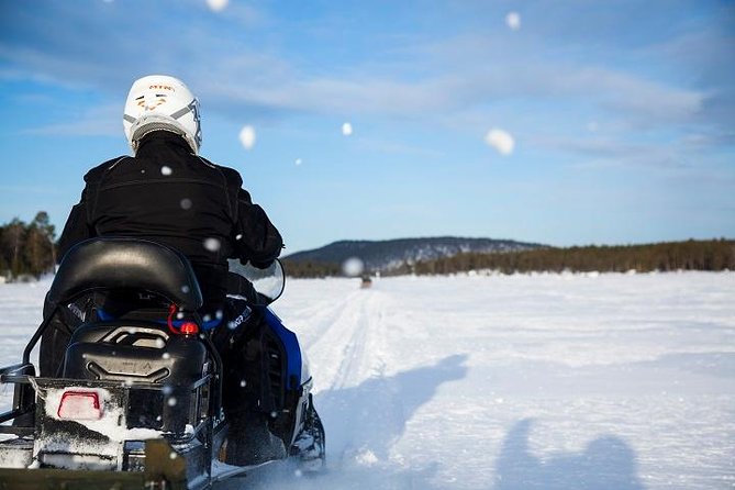 From Ivalo: Ice Fishing Safari to Lake Inari, reindeers & lunch - Getting dressed for Arctic conditions at Ivalo Safaris