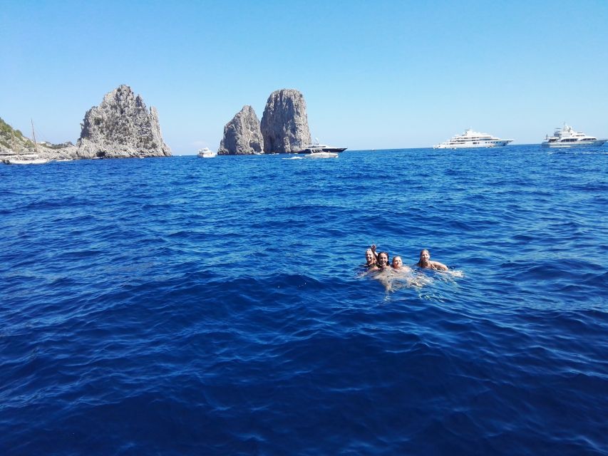 From Sorrento: Fishing in Capri with Lunch - Swimming and snorkeling in clear water