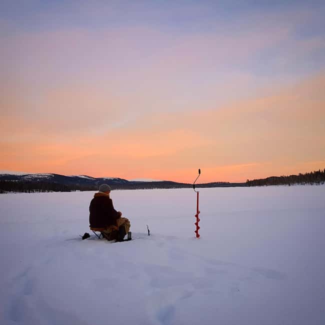 Ice-Fishing by Foot on Lake Ylläsjärvi - Meeting beside frozen Lake Ylläsjärvi