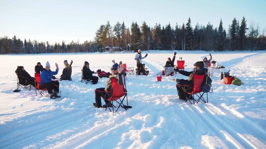 Ice fishing program in Lapland - Making your first hole in the ice