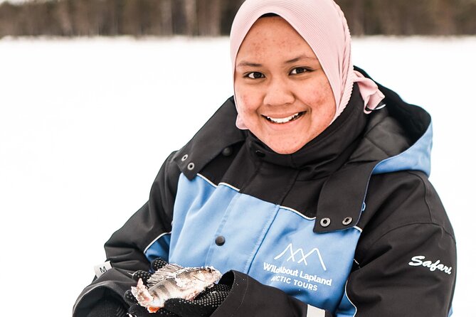 Ice Fishing Tour - The campfire, teepee, and Finnish snacks