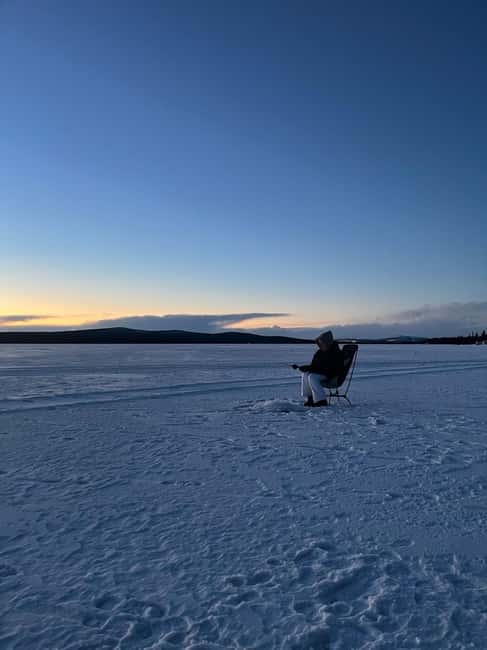 Kiruna: Private Ice Fishing Tour - Drilling through Kiruna’s frozen lake