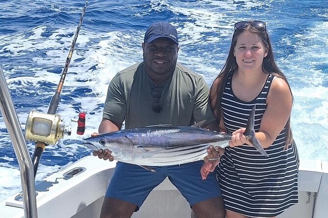 Kona Hawaii Deep Sea Fishing Escapade on the Bite Me 6 - Dolphins, whales, and the wider ocean view