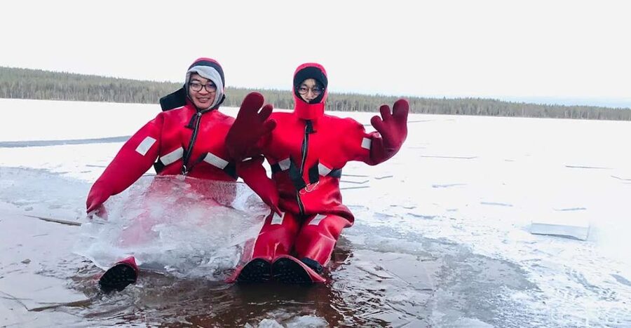 Lapland: Ice Fishing, Floating & BBQ Snow Adventure - The Salmon BBQ Brings the Day Together