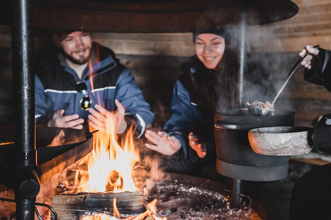 Lappish Lunch Break -Snowmobiling, ice fishing and tasty food - Learning the Finnish ice-fishing tradition
