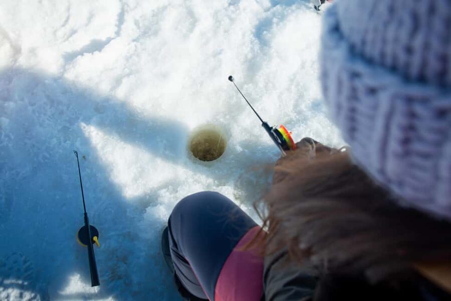 Levi: Arctic Ice-Fishing Experience - If luck strikes, cooking the fish over the fire