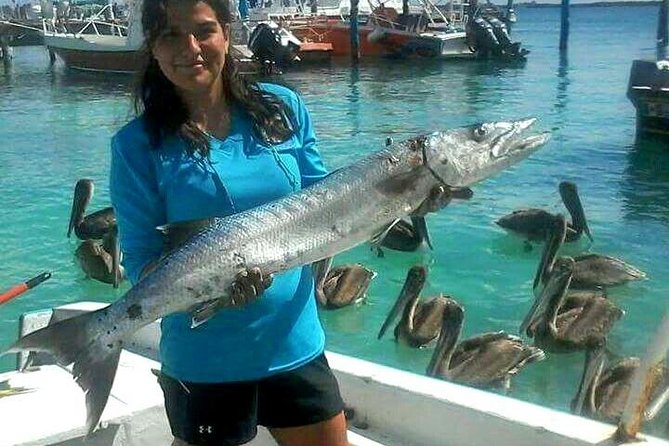 Local Fishing Plus Snorkeling Tour in Isla Mujeres - Trading the rod for a mask and snorkel