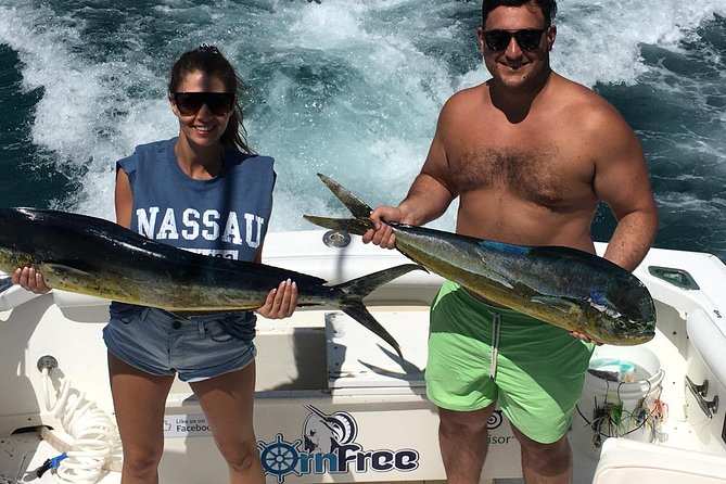 Private Snorkeling or Fishing from Nassau - 31ft Sitting Pretty - Beach time, swimming, and harbor sightseeing