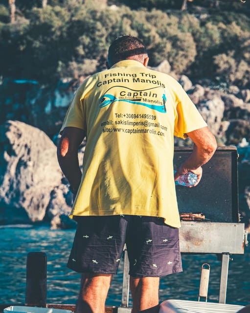 Rhodes: Captain Manolis Fishing Trip with BBQ and Swimming - The onboard BBQ and Greek-style lunch