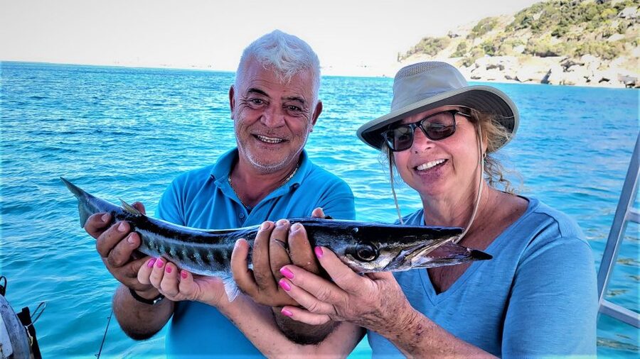 Rhodes: Fishing Trip, Snorkelling, BBQ, & Professional Guide - Skevos and Captain Mike keep the mood relaxed