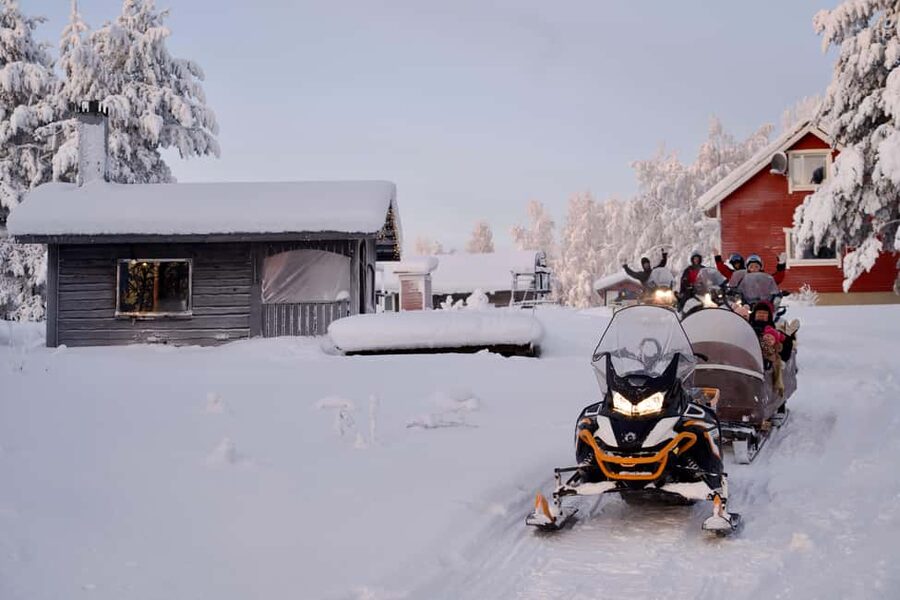 Rovaniemi: Ice Fishing and Snowmobile Tour with Snacks - A Snowmobile Ride With a Quiet Finish
