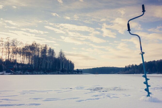 Rovaniemi: Ice Fishing from Private Lakefront Property & BBQ - Learning the basic Finnish way to ice fish