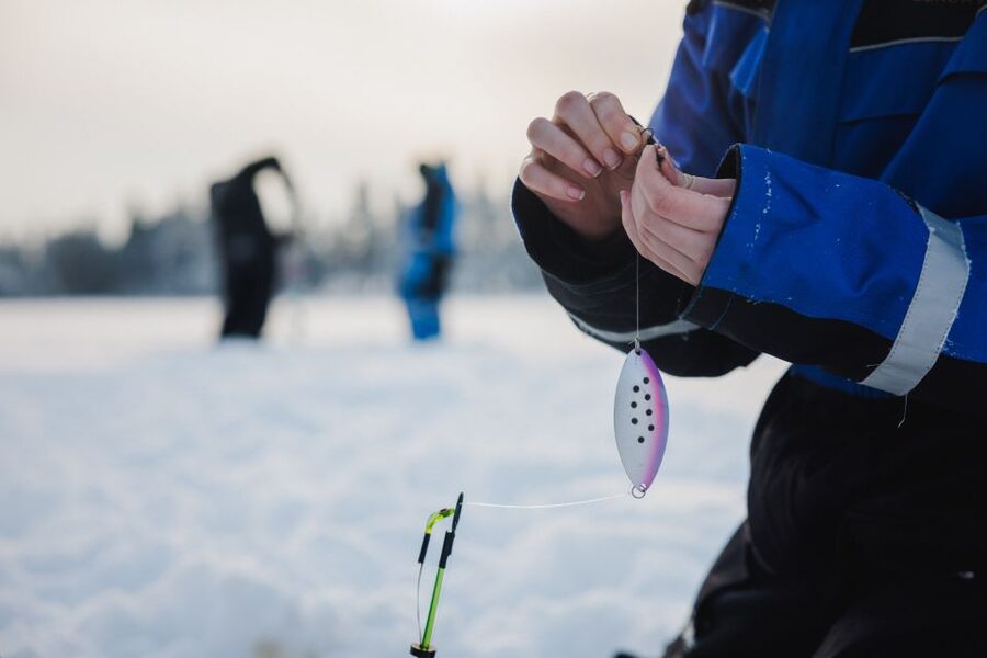 Rovaniemi: Ice Fishing & Snowmobile Safari Combo Day - Getting fitted for Arctic clothing