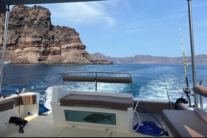 Santorini Fishing Private Cruise boat tour - BBQ, Snorkeling - Leaving Ormos Ammoudiou for the caldera