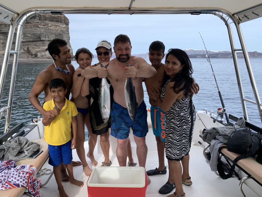 Santorini Private Cruise boat fishing tour - BBQ, Snorkeling - Watching Oia from the water