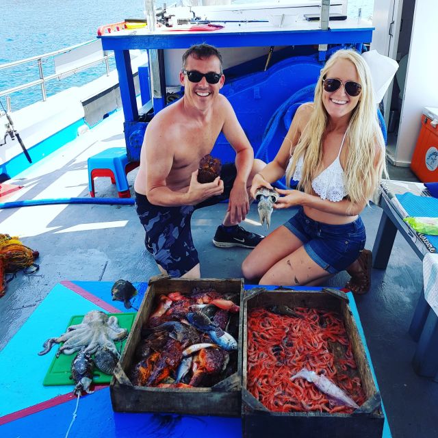 Santorini Sunset Fishing Trip with Dinner and Drinks - A fresh dinner prepared on board