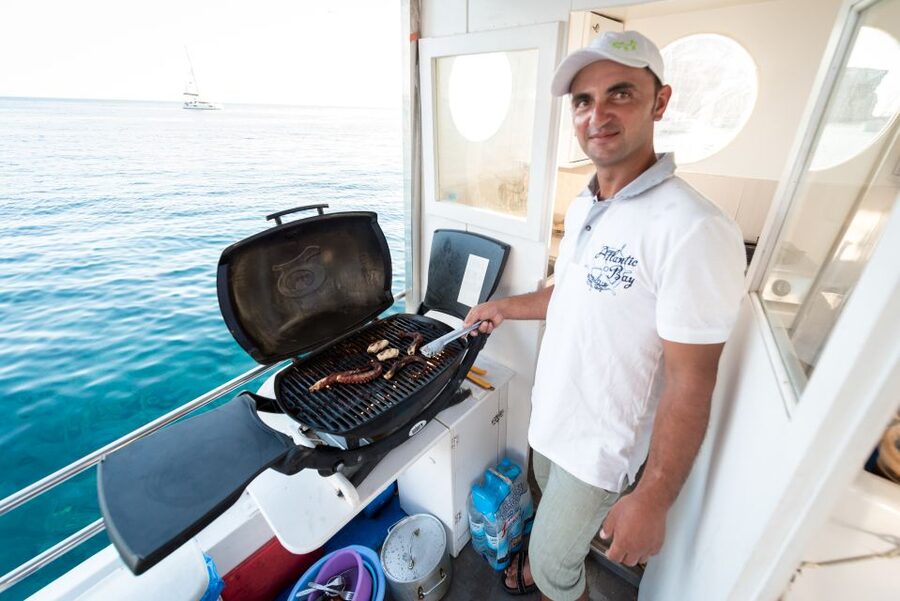 Santorini: Traditional Fishing Trip and Fresh Fish Lunch - Swimming and snorkeling near the beaches
