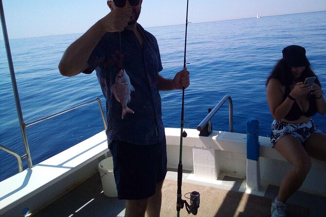 Semi Private and Private Daily Fishing Trip Athens - Fishing with artificial bait and trying for squid