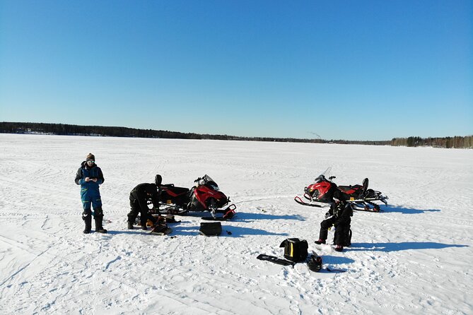 Snowmobile and Ice Fishing Excursion (private tour) - Crossing the frozen river for about an hour