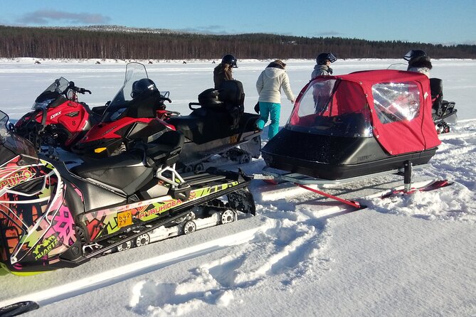 Snowmobile and Ice Fishing Excursion (private tour) - Ice fishing on a frozen lake