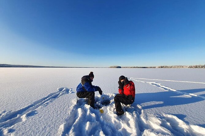 Snowmobile and Ice Fishing Experience - Getting suited up in Rovaniemi