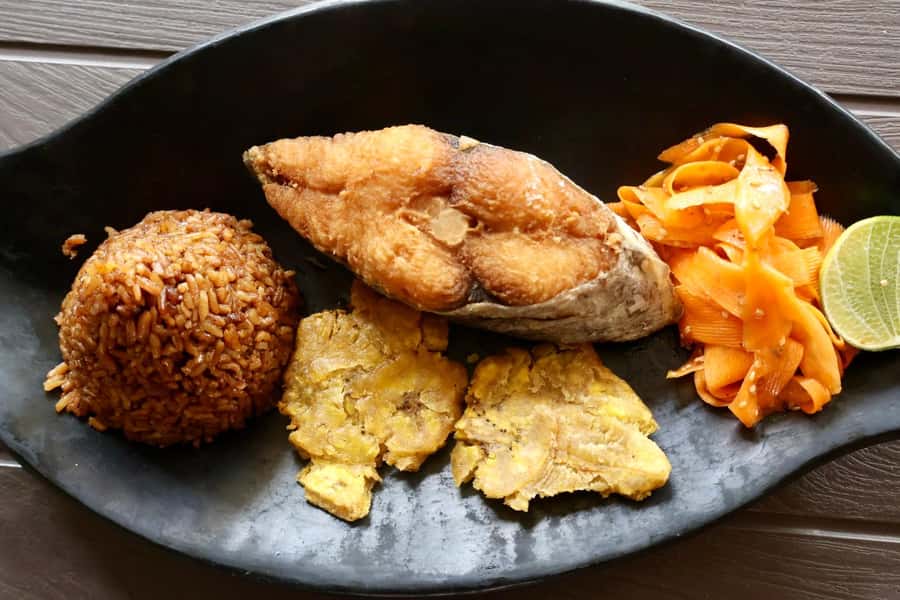 Typical lunch on beach, mangrove tour & fishing with natives - A generous coastal lunch at 12:30