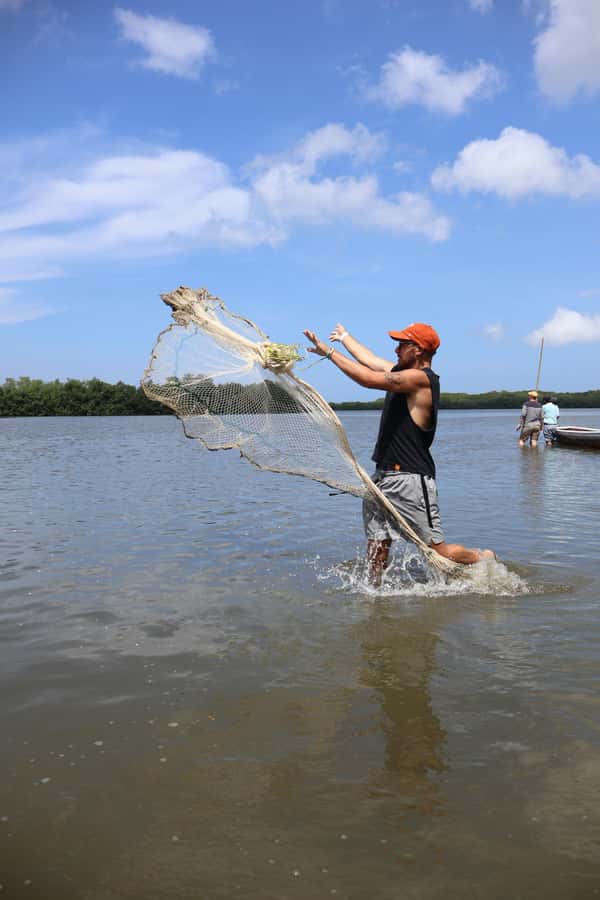 Typical lunch on beach, mangrove tour & fishing with natives - Pickup, timing, and the $84 price