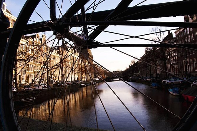Urban Adventures Amsterdam Bike Tour, Graffiti and Magnet Fishing - Crossing to North by ferry