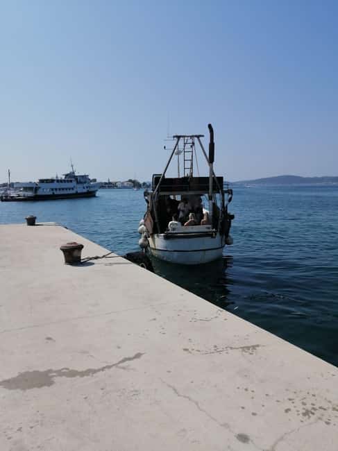 Zadar: Fishing Boat Trip with Lunch and Swimming Included - Morning snacks and the first stretch through the Zadar Channel